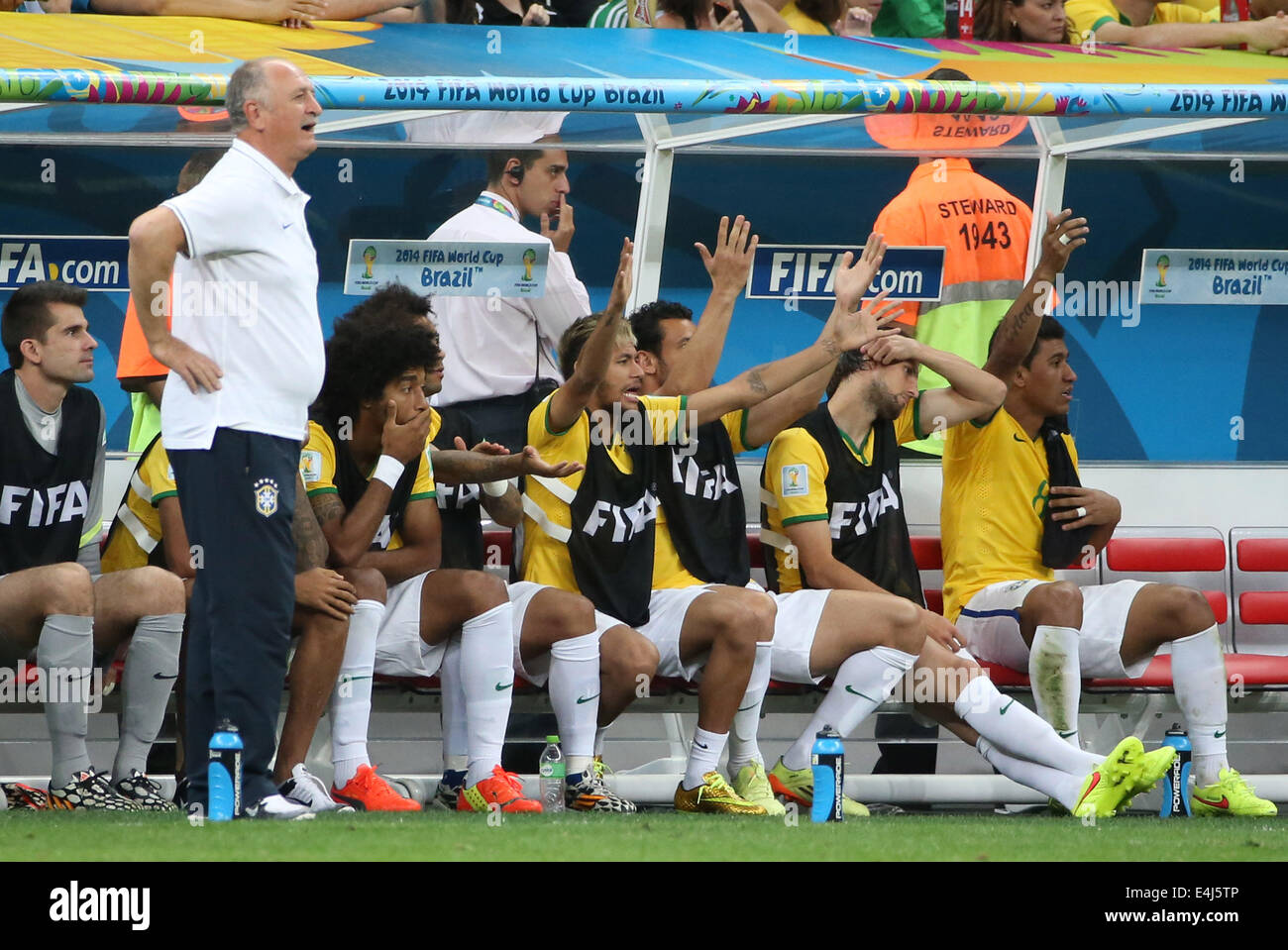 Brasilia, Brazil. 12th July, 2014. Brazil's Neymar (4th R) reacts while watching the third place play-off match between Brazil and Netherlands of 2014 FIFA World Cup at the Estadio Nacional Stadium in Brasilia, Brazil, on July 12, 2014. Netherlands won 3-0 over Brazil and took the third place of the tournament on Saturday. Credit:  Cao Can/Xinhua/Alamy Live News Stock Photo