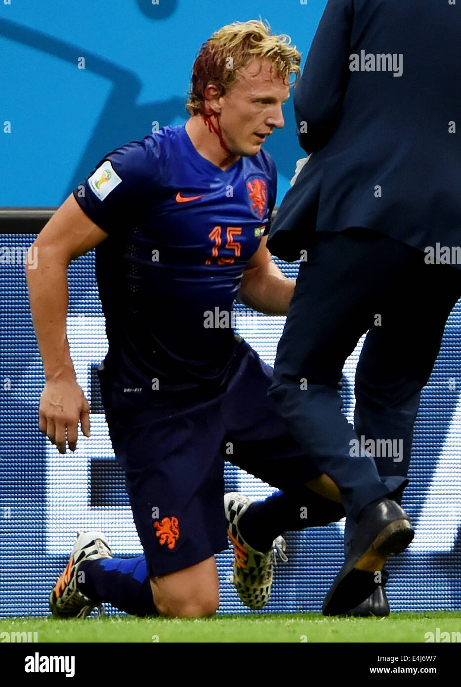 Brasilia, Brazil. 12th July, 2014. Netherlands' Dirk Kuyt bleeds during the third place play-off match between Brazil and Netherlands of 2014 FIFA World Cup at the Estadio Nacional Stadium in Brasilia, Brazil, on July 12, 2014. Credit:  Guo Yong/Xinhua/Alamy Live News Stock Photo