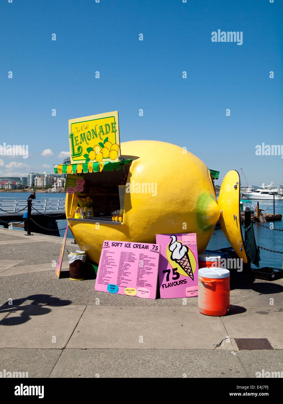 A view of a giant lemon lemonade stand on the Inner Harbour in Victoria