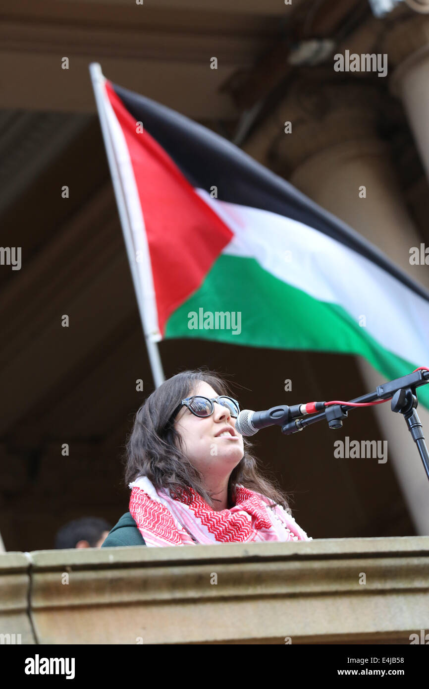 Sydney, NSW, Australia. 13 July 2014. Miss Hassan from Socialist Alternative speaks from the steps of Sydney Town Hall at the rally in support of Palestine. Estimates put the number of those attending at around 4,000. Copyright Credit:  2014 Richard Milnes/Alamy Live News Stock Photo