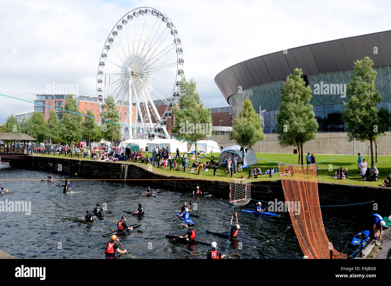 Canoe polo being played by the Liverpool Eye 360 in the Albert Dock, Liverpool, England UK Stock