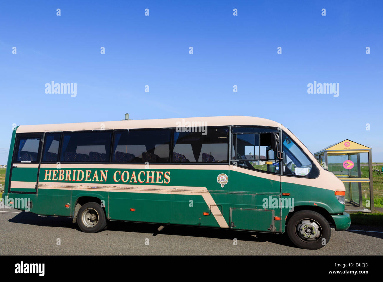 Exterior of Hebridean Coaches bus waiting at a bus stop. Solas, North Uist, Outer Hebrides, Western Isles, Scotland, UK, Britain Stock Photo