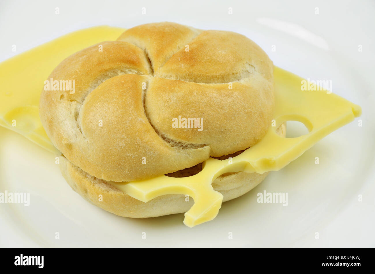 submarine sandwich with cheese on white plate, close up Stock Photo