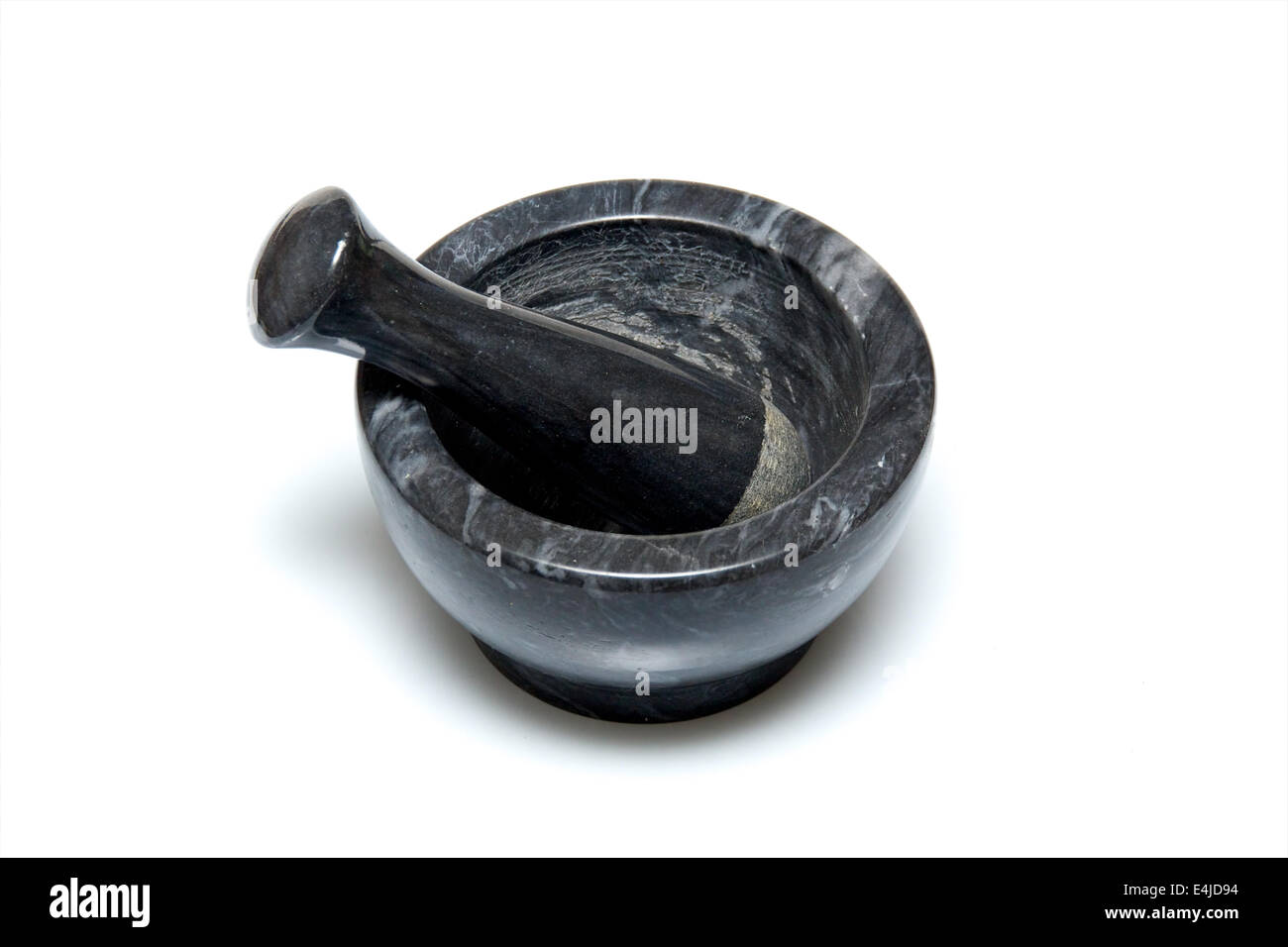 A traditional marble mortar and pestle used for grinding up herbs or