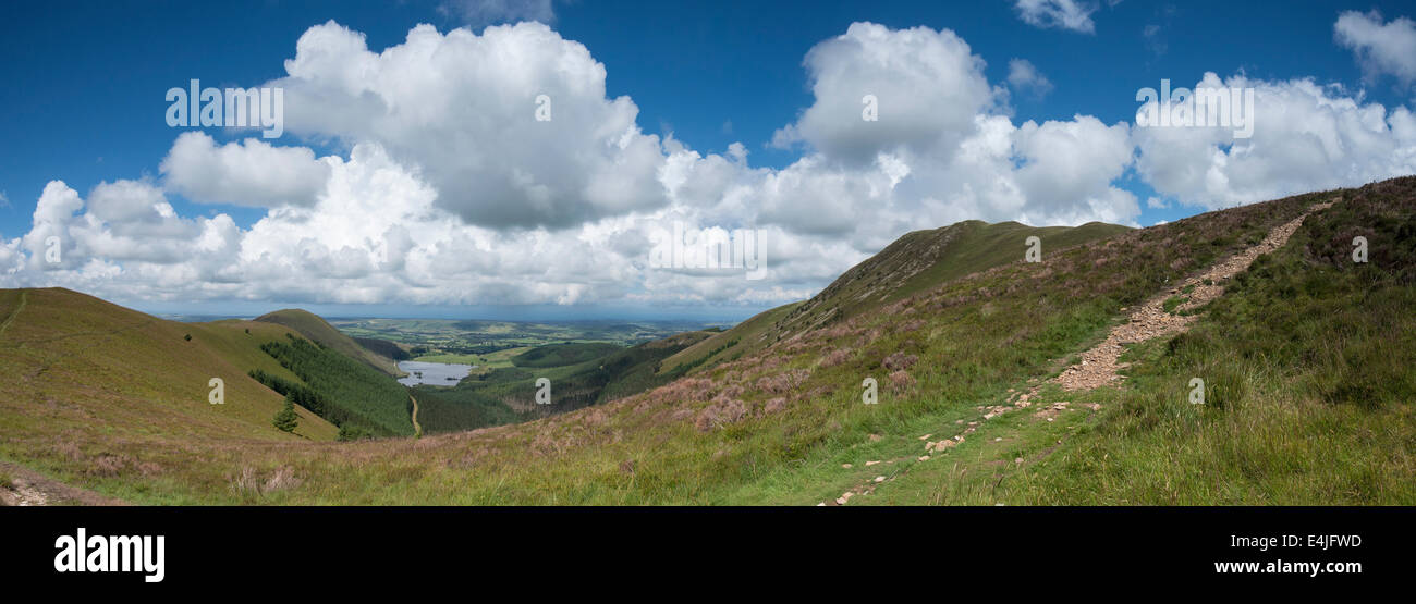 Panorama landscape from Blake Fell in the Lake District, looking West on a Summer afternoon over Cogra Moss Stock Photo