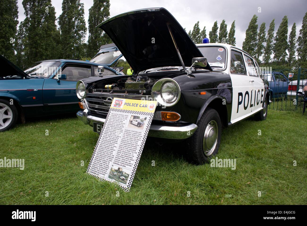 Manchester, UK 13th July 2014 An Austin/Morris 1800S police car with a