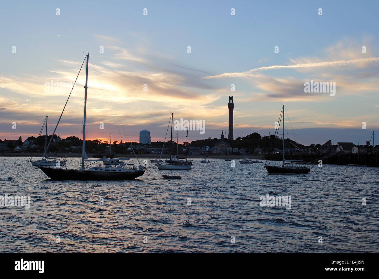 Harbor Provincetown MA Cape Cod at sunset with Provincetown Monument Stock Photo