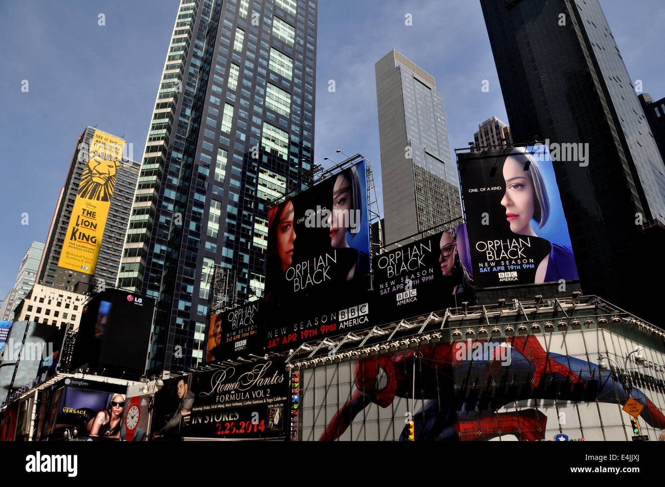 New York City: Giant advertising billboards cover building facades overlooking legendary Times Square Stock Photo