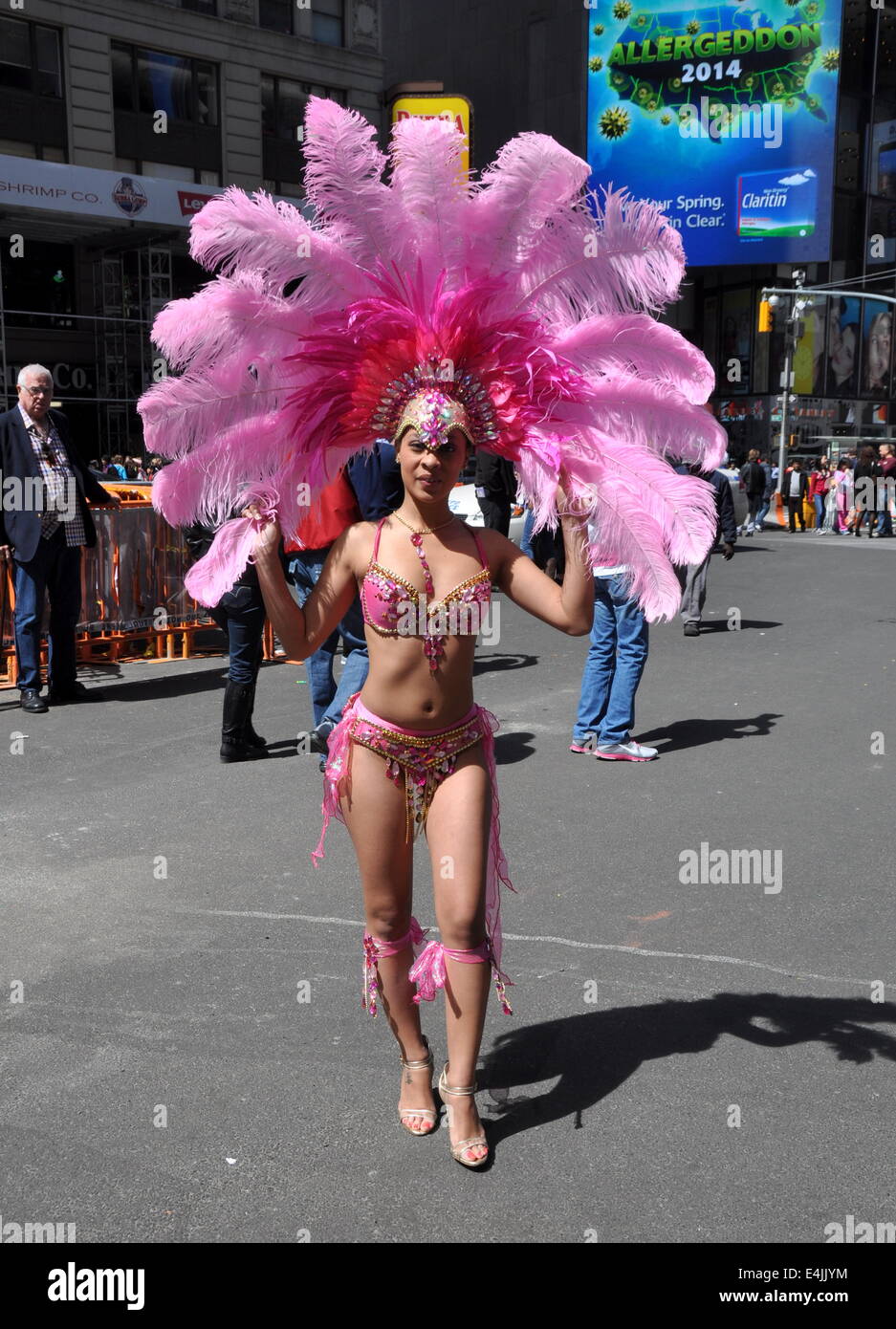 NYC:  Broadway showgirl with enormous headdress in Times Square Stock Photo