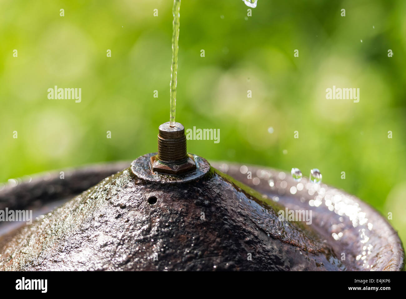 Public Water Fountain With Water Flowing Close Up Stock Photo