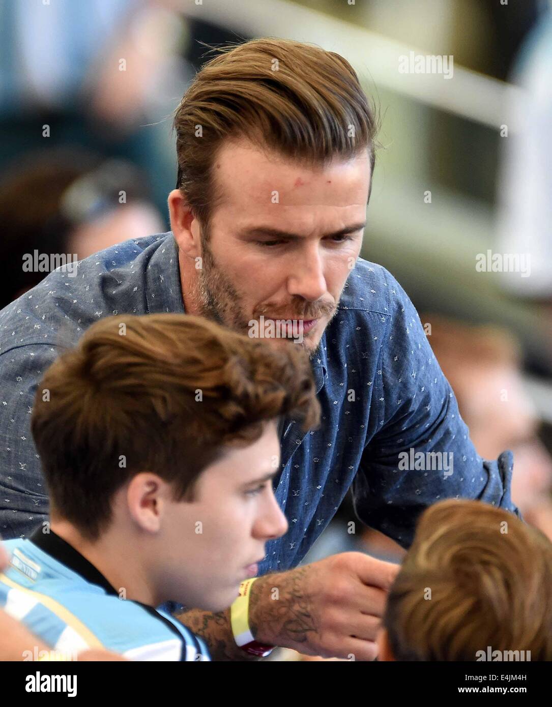 Rio de Janeiro, Brazil. 13th July, 2014. English former soccer player David Beckham seen in the stands before the FIFA World Cup 2014 final soccer match between Germany and Argentina at the Estadio do Maracana in Rio de Janeiro, Brazil, 13 July 2014. Photo: Thomas Eisenhuth/dpa/Alamy Live News Stock Photo