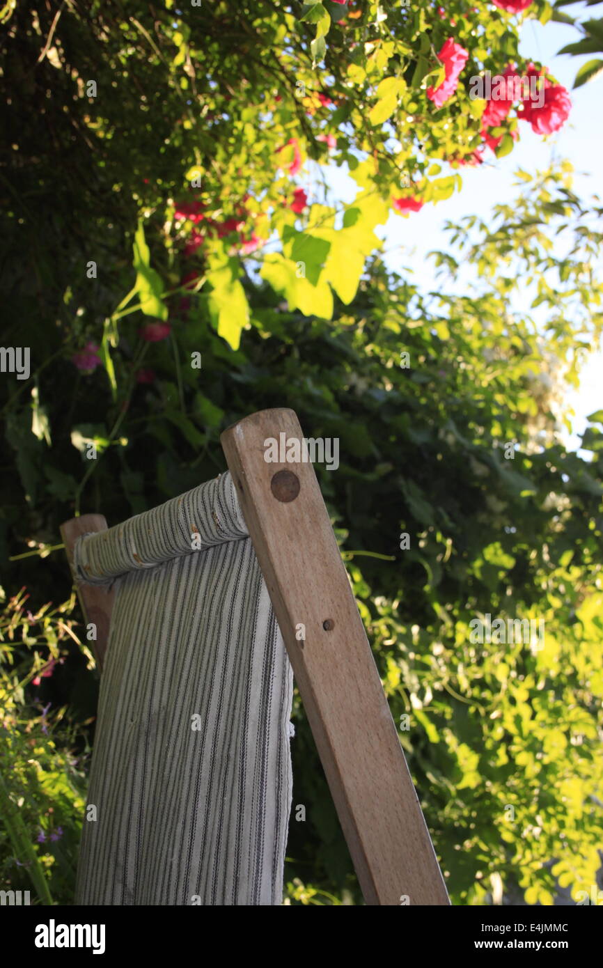 Deckchair in garden, English Summer Stock Photo
