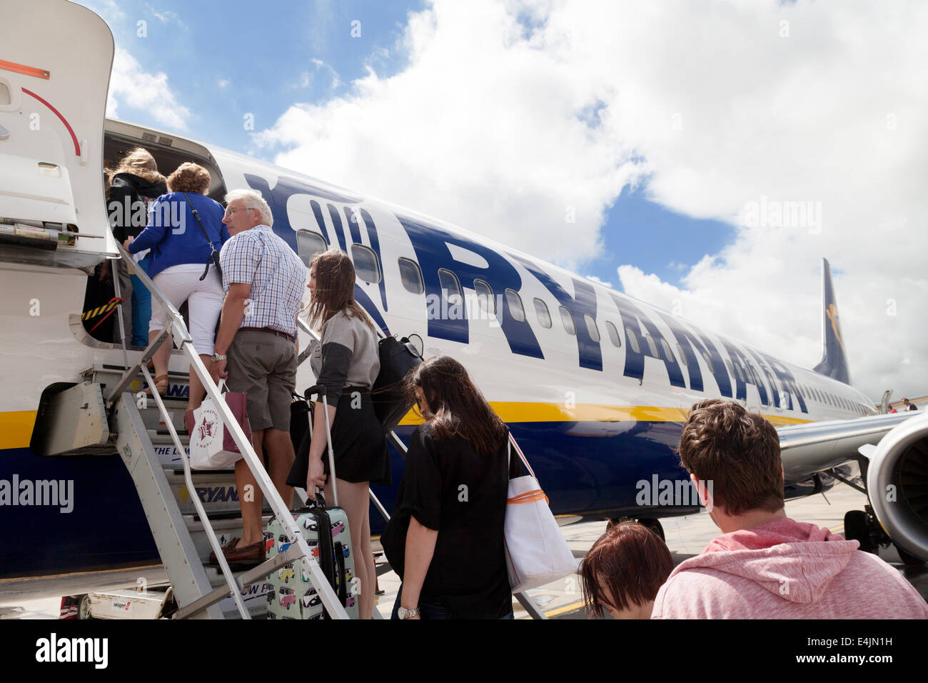 Passengers boarding a Ryanair plane at Stansted Airport, London UK Stock Photo