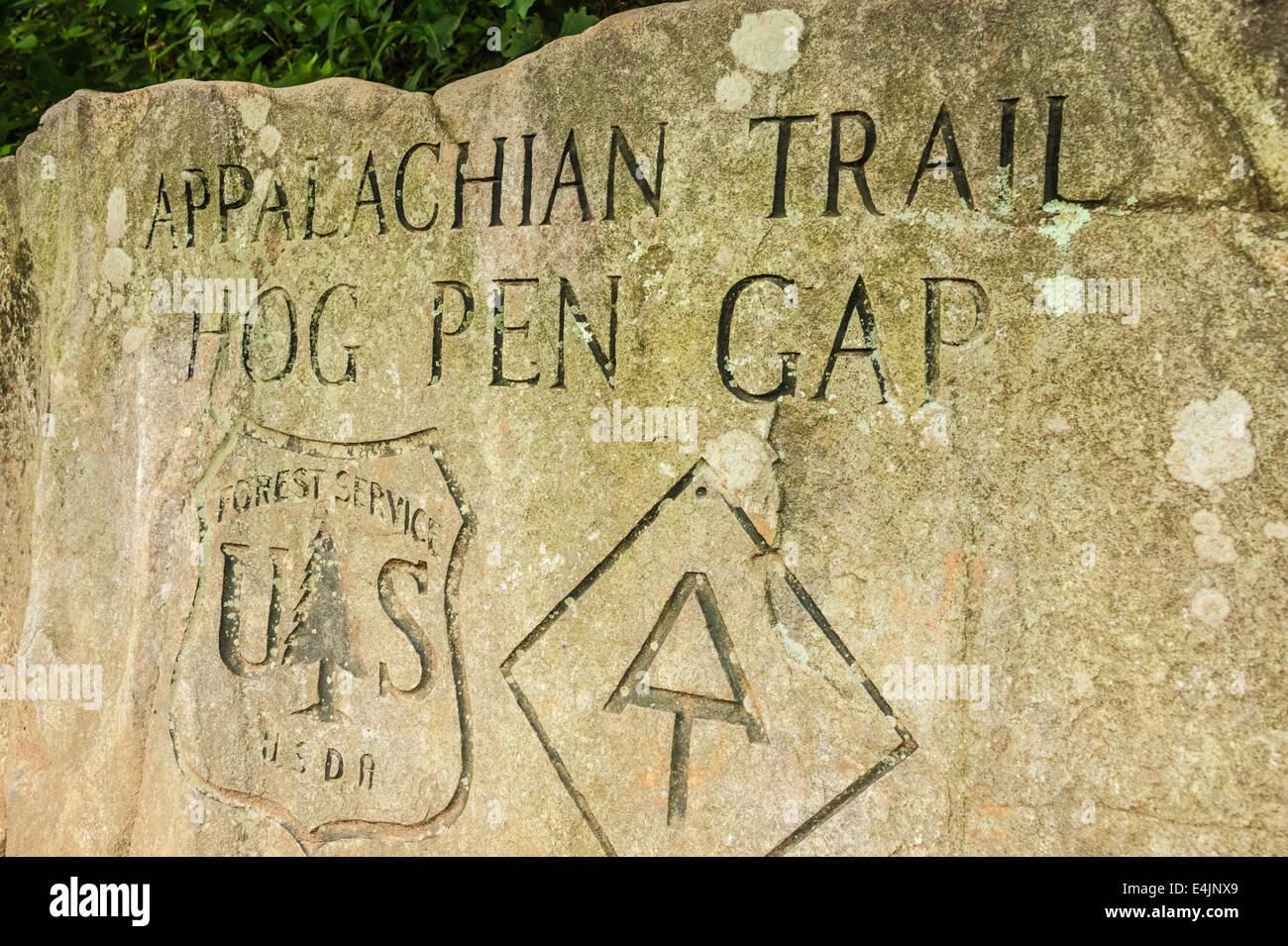 Stone marker where the Appalachian Trail meets the Richard B. Russell Scenic Highway at Hog Pen Gap in North Georgia, USA. Stock Photo