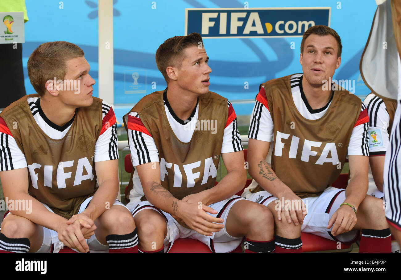 Rio de Janeiro, Brazil. 13th July, 2014. Matthias Ginter (L-R), Erik Durm and Kevin Grosskreutz of Germany sit on the bench during the FIFA World Cup 2014 final soccer match between Germany and Argentina at the Estadio do Maracana in Rio de Janeiro, Brazil, 13 July 2014. Photo: Andreas Gebert/dpa/Alamy Live News Stock Photo