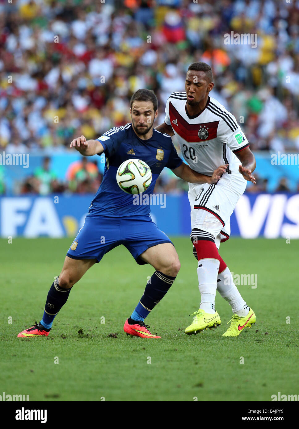 Rio de Janeiro, Brazil. 13th July, 2014. World Cup Final. Germany versus Argentina. Higuain and Boateng Credit:  Action Plus Sports/Alamy Live News Stock Photo