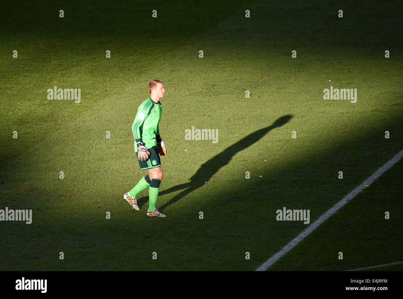 Rio de Janeiro, Brazil. 13th July, 2014. Goalkeeper Manuel Neuer of Germany walks on the pitch during the FIFA World Cup 2014 final soccer match between Germany and Argentina at the Estadio do Maracana in Rio de Janeiro, Brazil, 13 July 2014. Photo: Thomas Eisenhuth/dpa/Alamy Live News Stock Photo