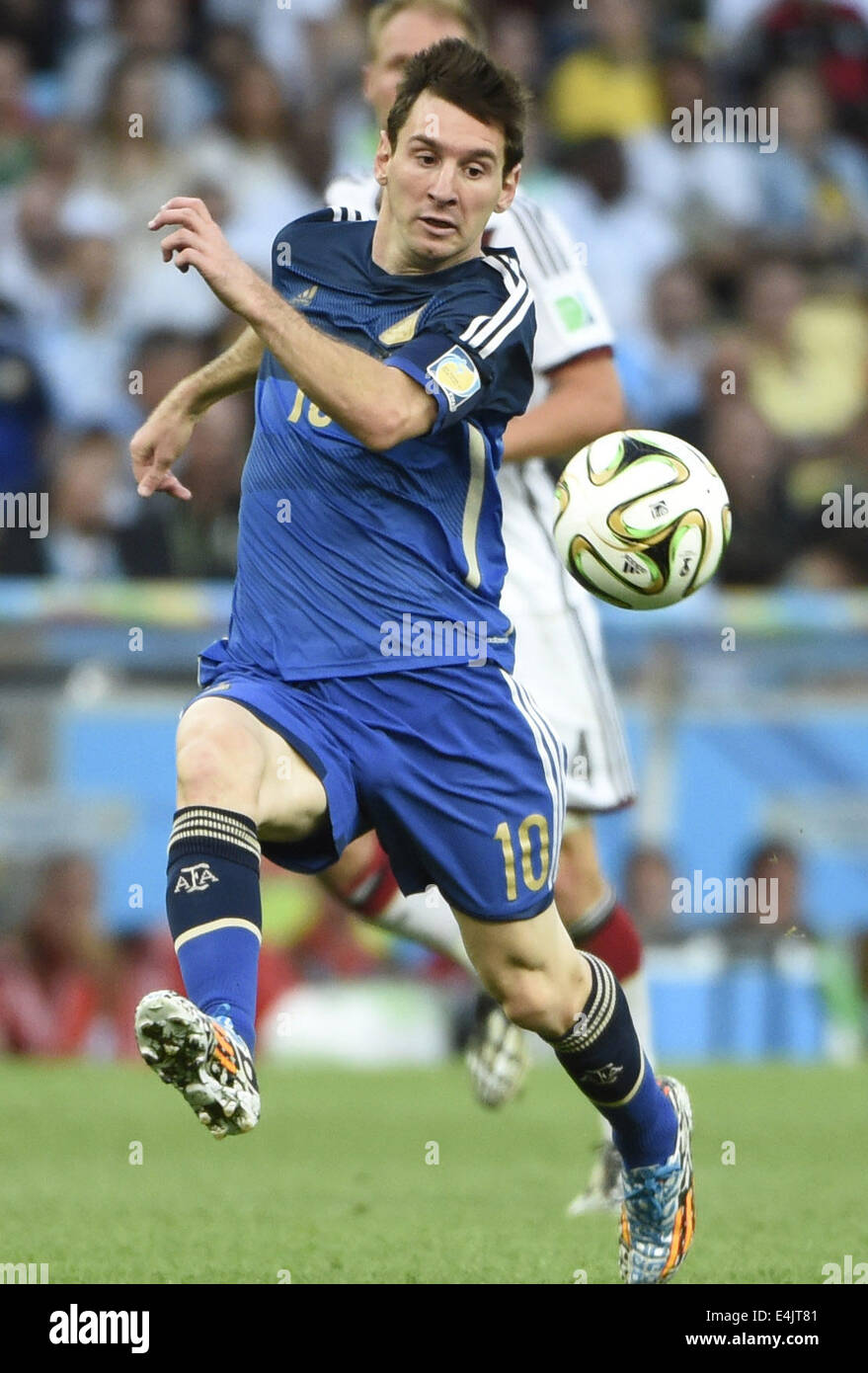 Rio De Janeiro, Brazil. 13th July, 2014. Argentina's Lionel Messi controls the ball during the final match between Germany and Argentina of 2014 FIFA World Cup at the Estadio do Maracana Stadium in Rio de Janeiro, Brazil, on July 13, 2014. Credit:  Yang Lei/Xinhua/Alamy Live News Stock Photo