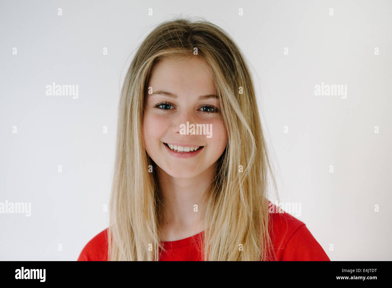 Pretty blonde teenage girl smiling Stock Photo