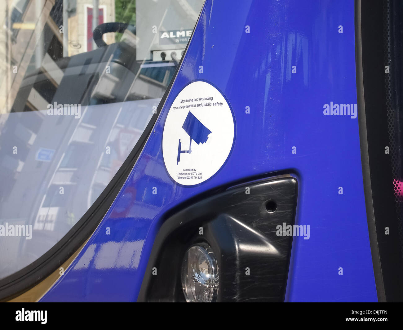 A sign on the front of a Star bus run by First Group showing that CCTV is present on the bus Stock Photo