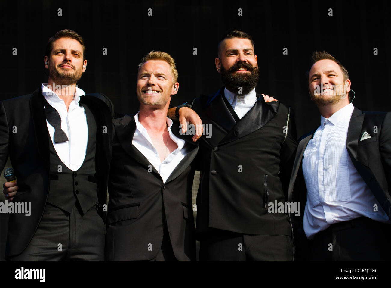 LONDON, ENGLAND - JULY 13: (L-R) Keith Duffy; Ronan Keating; Shane Lynch and Mikey Graham of Boyzone performs on stage at Britis Stock Photo