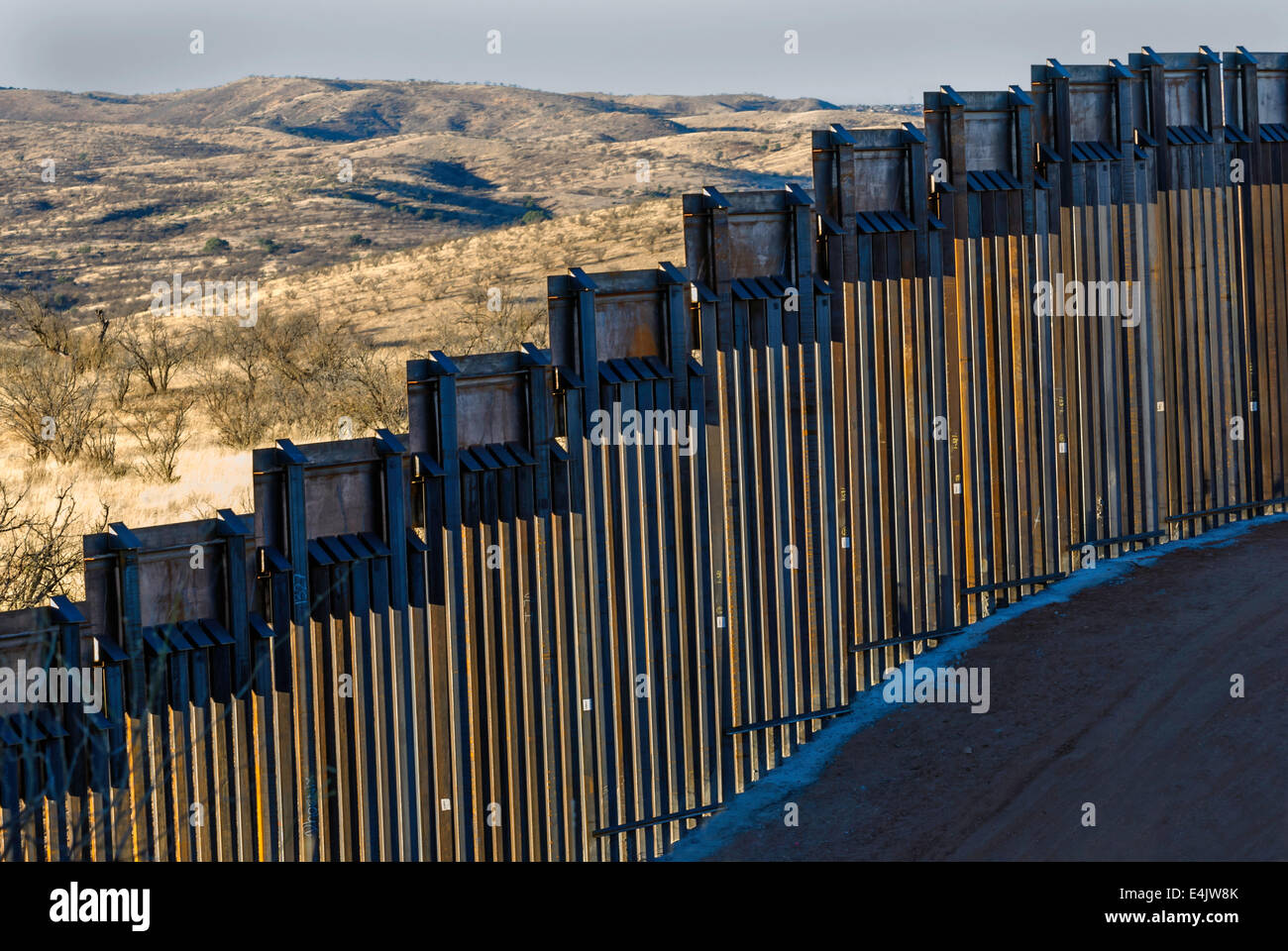 Massive US border fence on border with Mexico, about 6 miles east of Nogales Arizona, USA Stock Photo