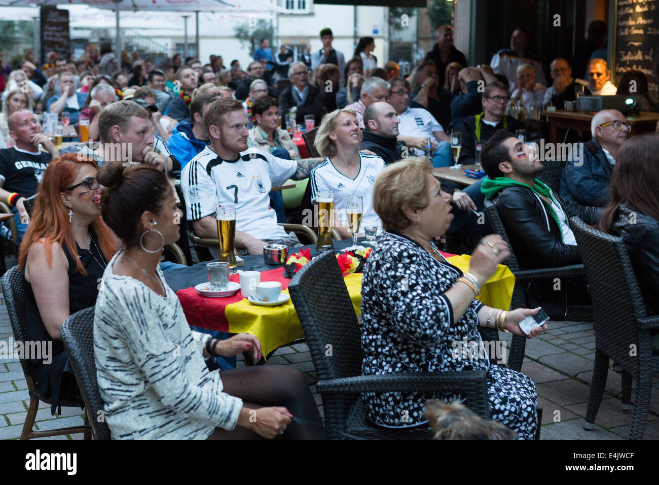 German football fans watch their team play Argentina in the World Cup final. Credit:  Gruffydd Thomas/Alamy Live News Stock Photo