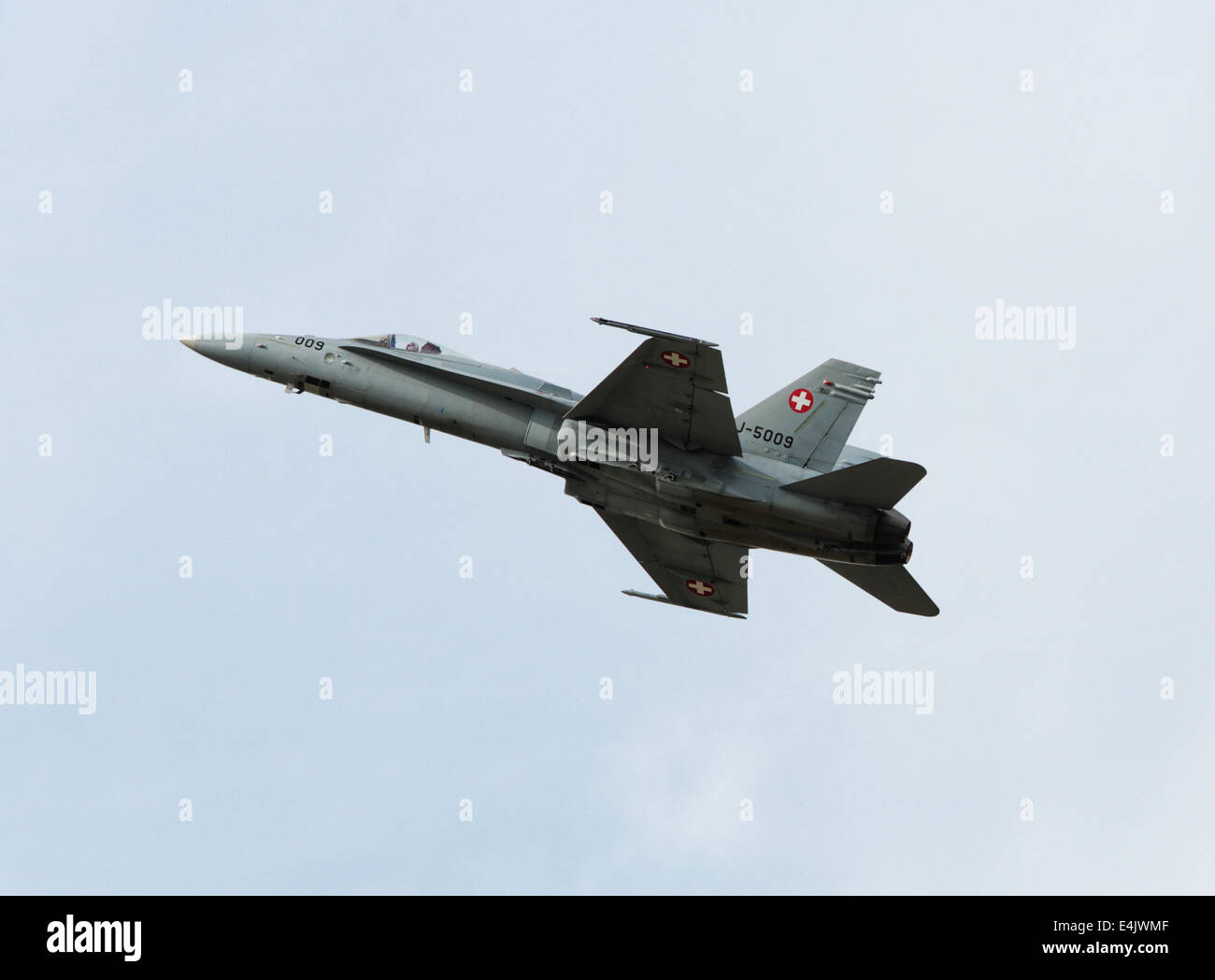 Fairford, Gloucs, UK. 12th July, 2014. Swiss air defence force F-18C Hornet jet fighter aircraft displaying at the 2014 Royal International Air Tattoo at RAF Fairford on 12 July. Credit:  Niall Ferguson/Alamy Live News Stock Photo