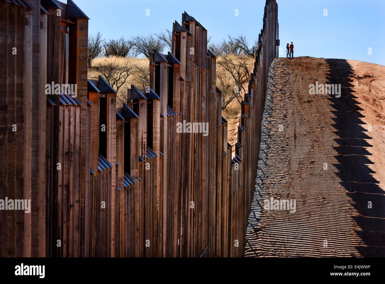 Massive US border fence on border with Mexico, about 6 miles east of Nogales Arizona, USA, looking west, viewed from US side Stock Photo