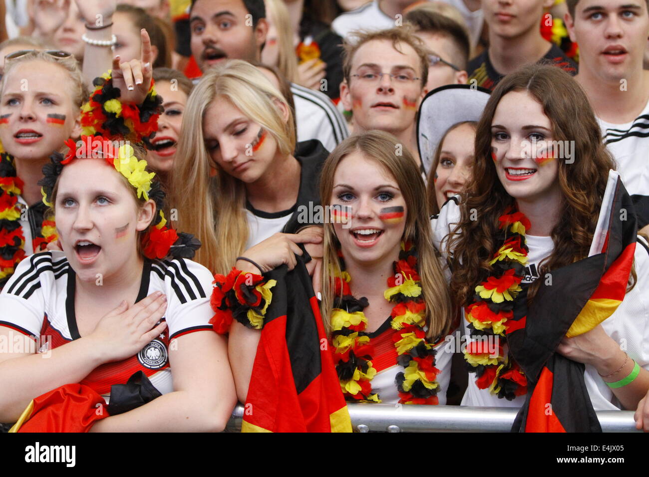 Frankfurt, Germany. 13th July, 2014. German fans sing the German National  Antheme. 50.000 fans watched the 2014 FIFA Soccer World Cup Final between  Germany and Argentina in Frankfurt's Commerzbank-Arena on Europe's largest