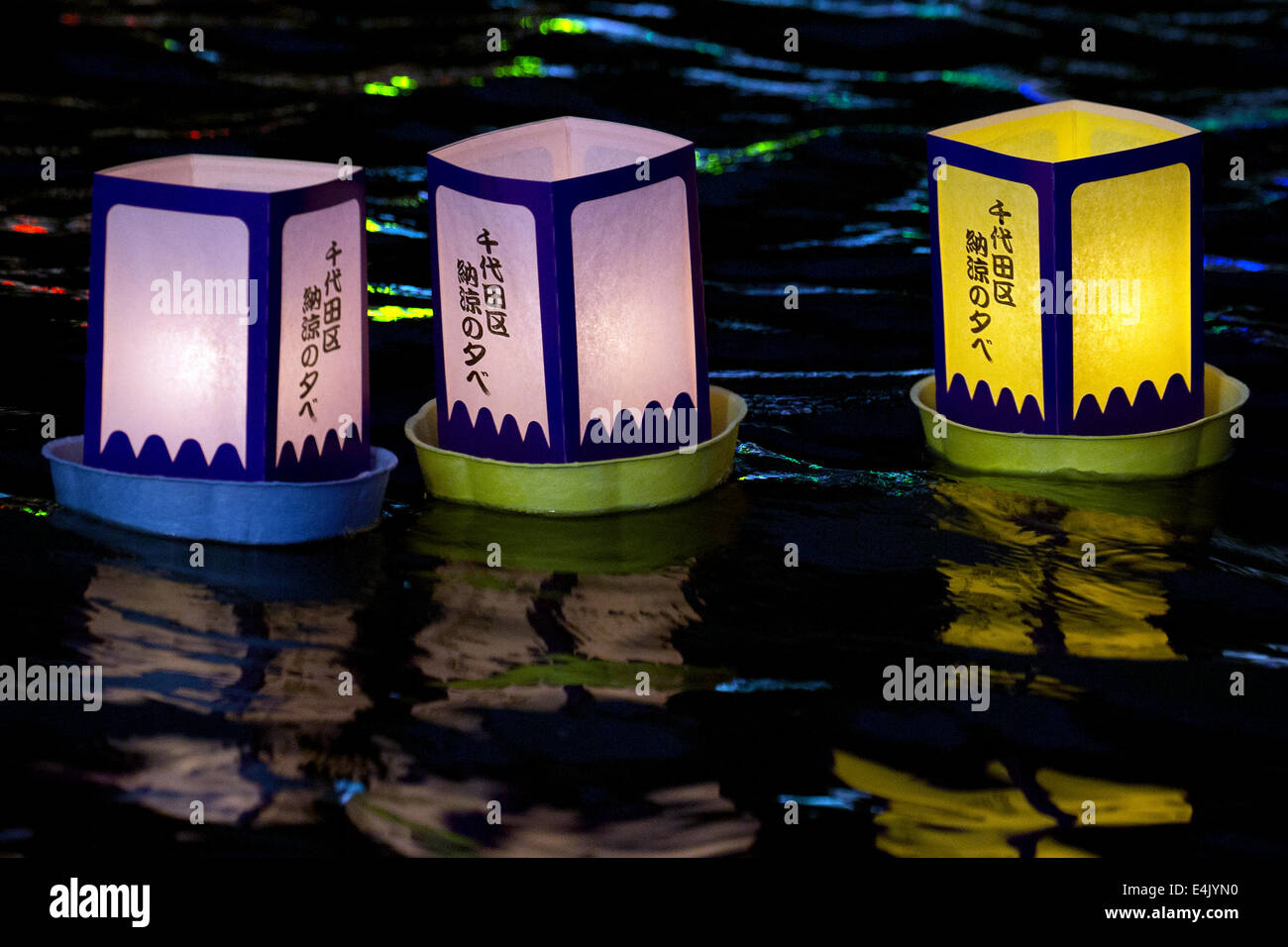Tokyo, Japan. 13th July, 2014. Paper lanterns float on the water to