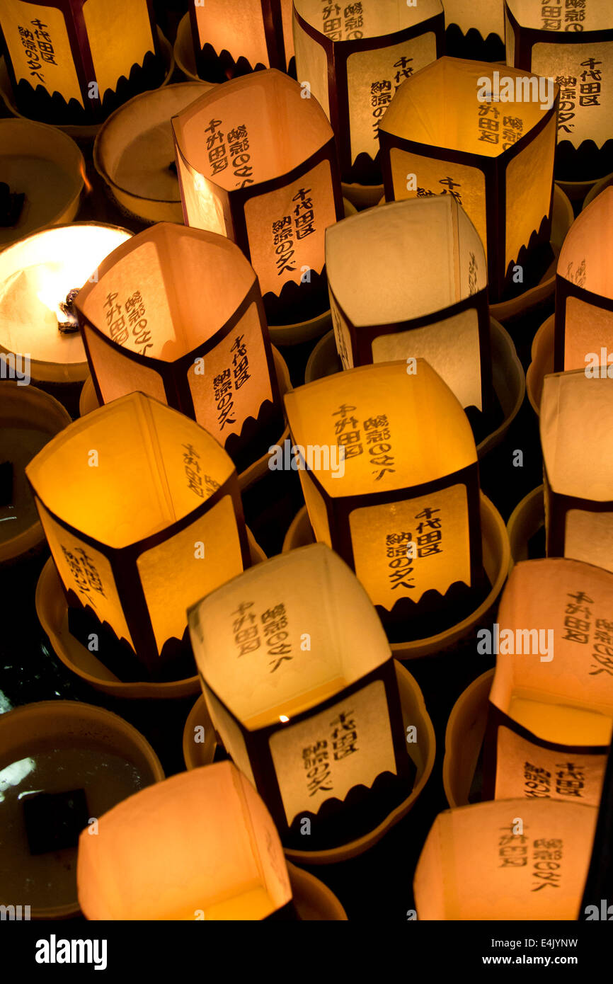 Tokyo, Japan. 13th July, 2014. Paper lanterns float on the water to