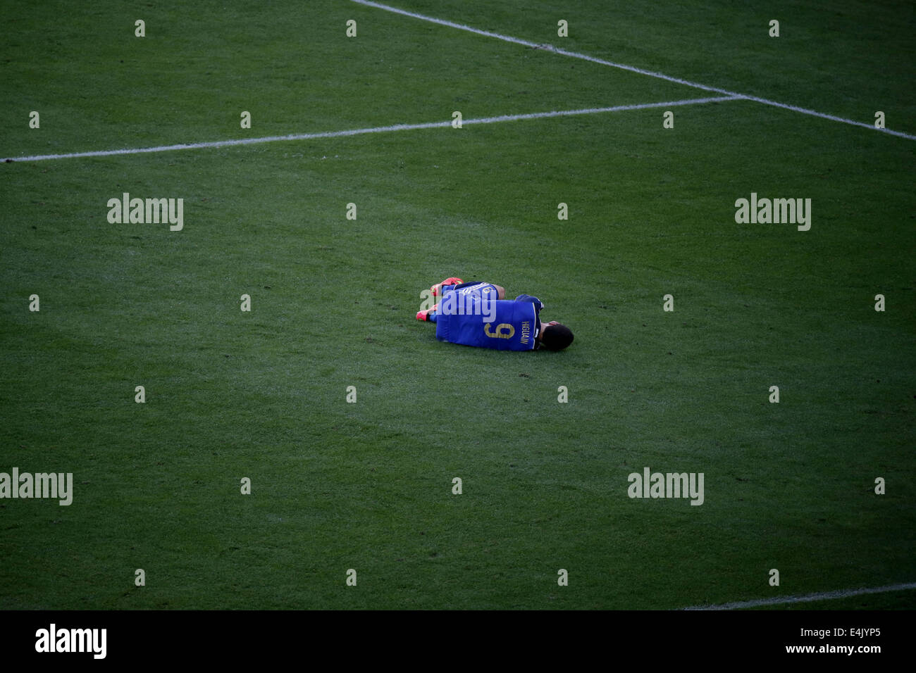 Rio De Janeiro, Brazil. 13th July, 2014. Argentina's Gonzalo Higuain falls down during the final match between Germany and Argentina of 2014 FIFA World Cup at the Estadio do Maracana Stadium in Rio de Janeiro, Brazil, on July 13, 2014. Credit:  Liao Yujie/Xinhua/Alamy Live News Stock Photo