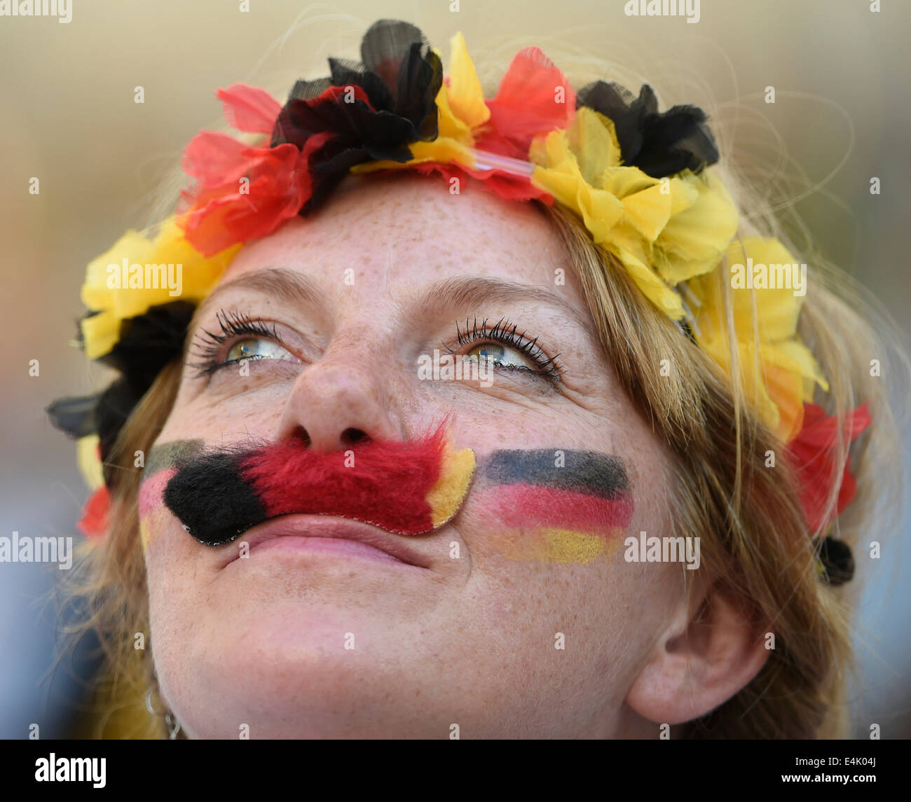 Rio De Janeiro, Brazil. 13th July, 2014. A Germany's fan looks on during the final match between Germany and Argentina of 2014 FIFA World Cup at the Estadio do Maracana Stadium in Rio de Janeiro, Brazil, on July 13, 2014. Credit:  Yang Lei/Xinhua/Alamy Live News Stock Photo