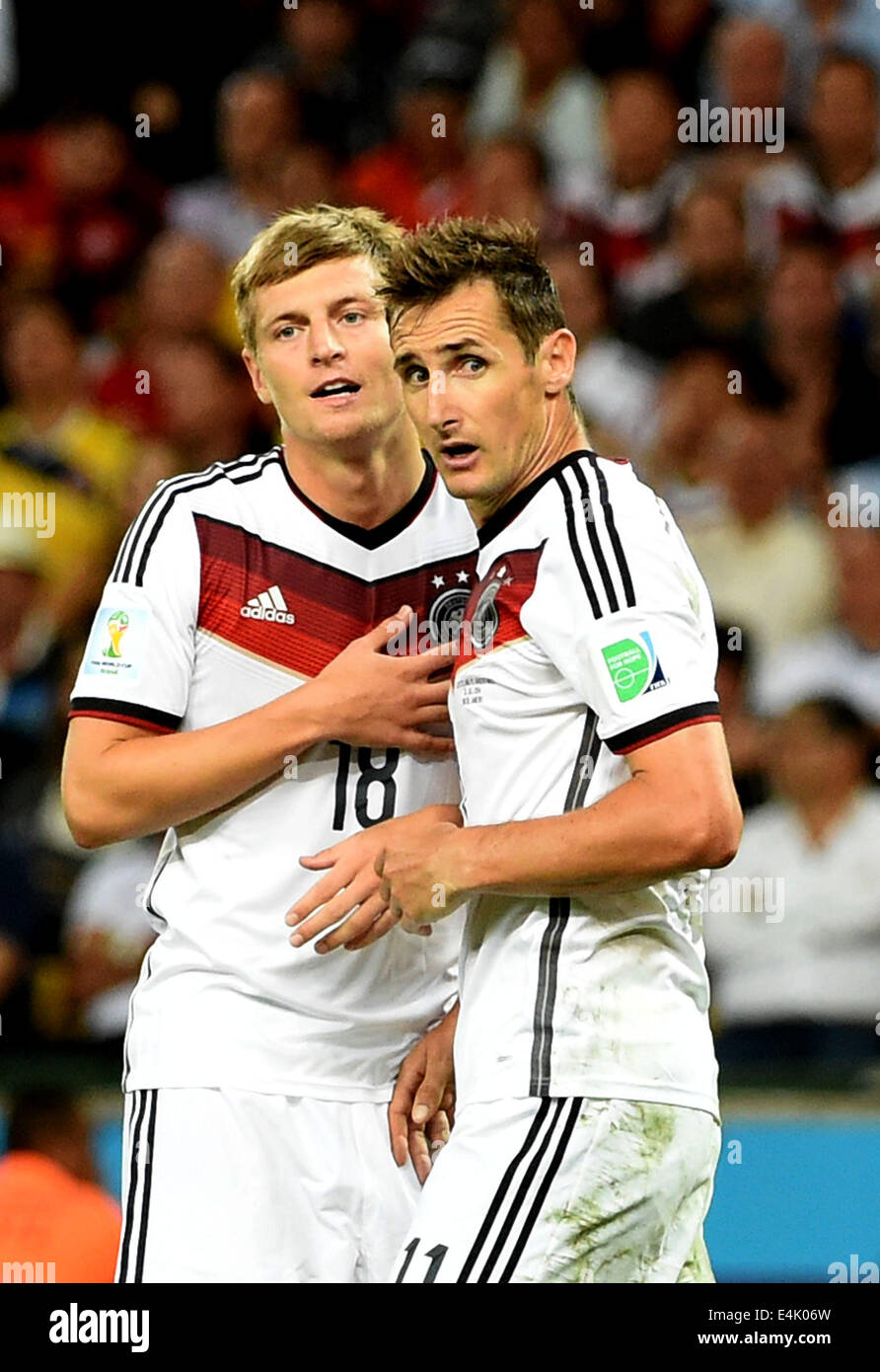 Rio De Janeiro, Brazil. 13th July, 2014. Germany's Miroslav Klose (R) and Toni Kroos react during the final match between Germany and Argentina of 2014 FIFA World Cup at the Estadio do Maracana Stadium in Rio de Janeiro, Brazil, on July 13, 2014. Credit:  Liu Dawei/Xinhua/Alamy Live News Stock Photo