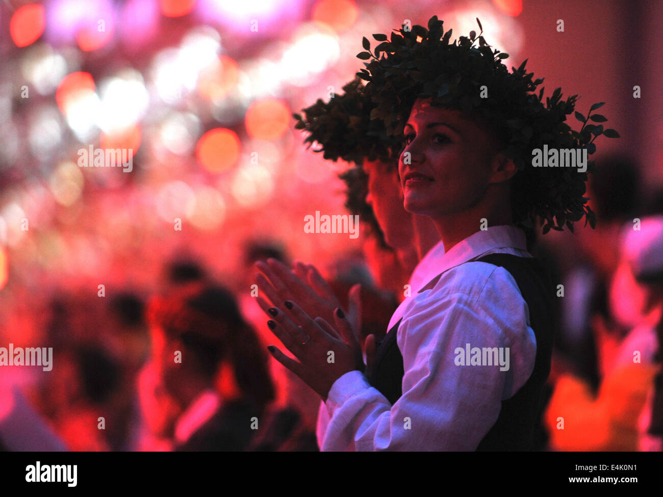 Singer From Riga Riga, Latvia. 13th July, 2014. A woman takes part in a 15,000-singer ...