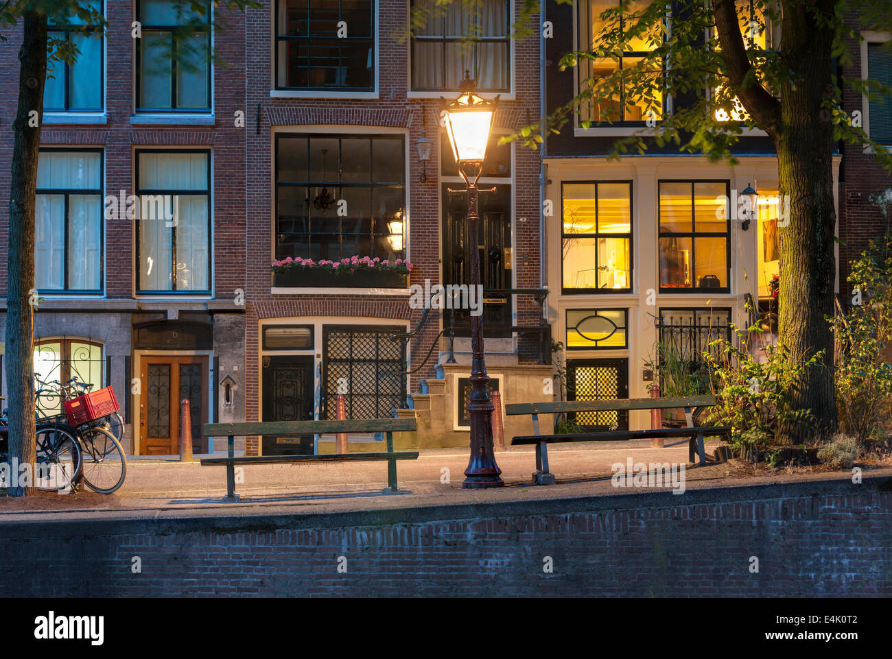 Amsterdam Canal night.  Leidsegracht Canal Amsterdam with popular canal-side bench from film The Fault in Our Stars TFiOS Stock Photo