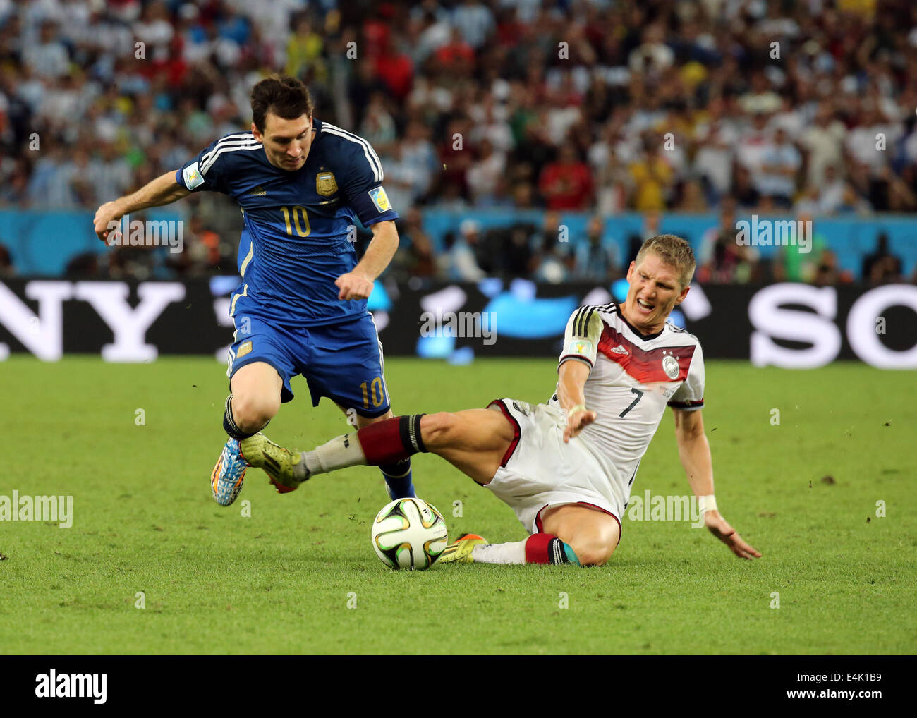 Rio de Janeiro, Brazil. 13th July, 2014. World Cup Final. Germany versus Argentina. Messi against Schweinsteiger Credit:  Action Plus Sports/Alamy Live News Stock Photo
