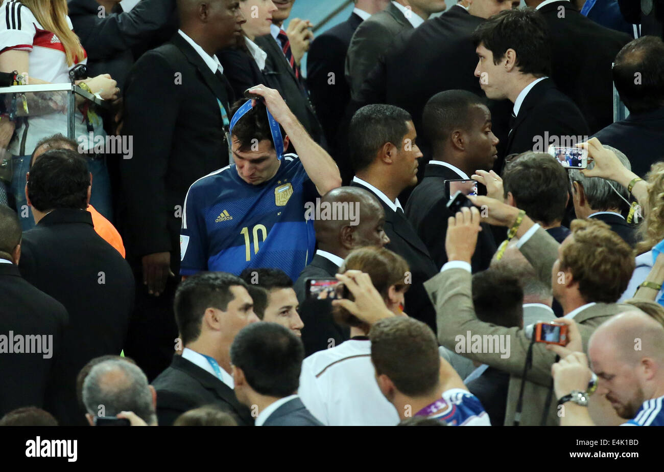 Rio de Janeiro, Brazil. 13th July, 2014. World Cup Final. Germany versus Argentina. Messi takes off his medal after awards ceremony Credit:  Action Plus Sports/Alamy Live News Stock Photo