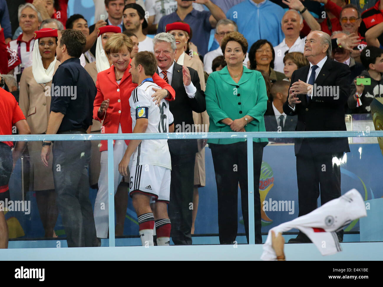 Rio de Janeiro, Brazil. 13th July, 2014. World Cup Final. Germany versus Argentina. Merkel celebrates Lahm at awards ceremony Credit:  Action Plus Sports/Alamy Live News Stock Photo
