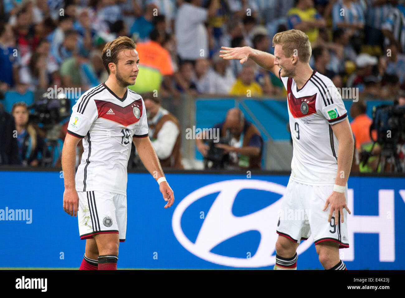 (L-R) Mario Gotze, Andre Schurrle (GER), JULY 13, 2014 - Football / Soccer : Mario Gotze of Germany celebrates after scoring his side first goal during the FIFA World Cup Brazil 2014 Final match between Germany 1-0 Argentina at the Maracana stadium in Rio de Janeiro, Brazil. (Photo by Maurizio Borsari/AFLO) Stock Photo