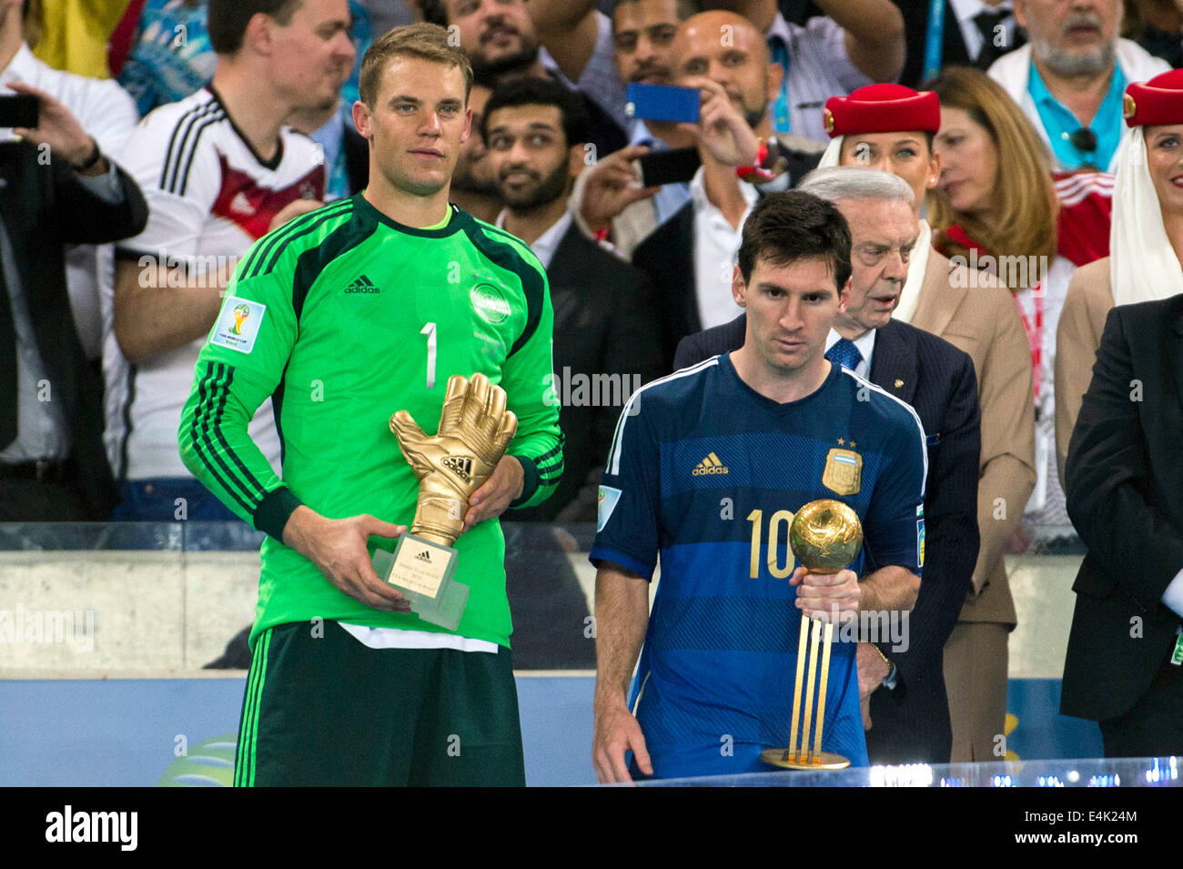 Manuel Neuer (GER), Lionel Messi (ARG), JULY 13, 2014 - Football / Soccer :  Manuel Neuer of Germany holds the Golden Glove trophy as Lionel Messi of  Argentina holds the Golden Ball