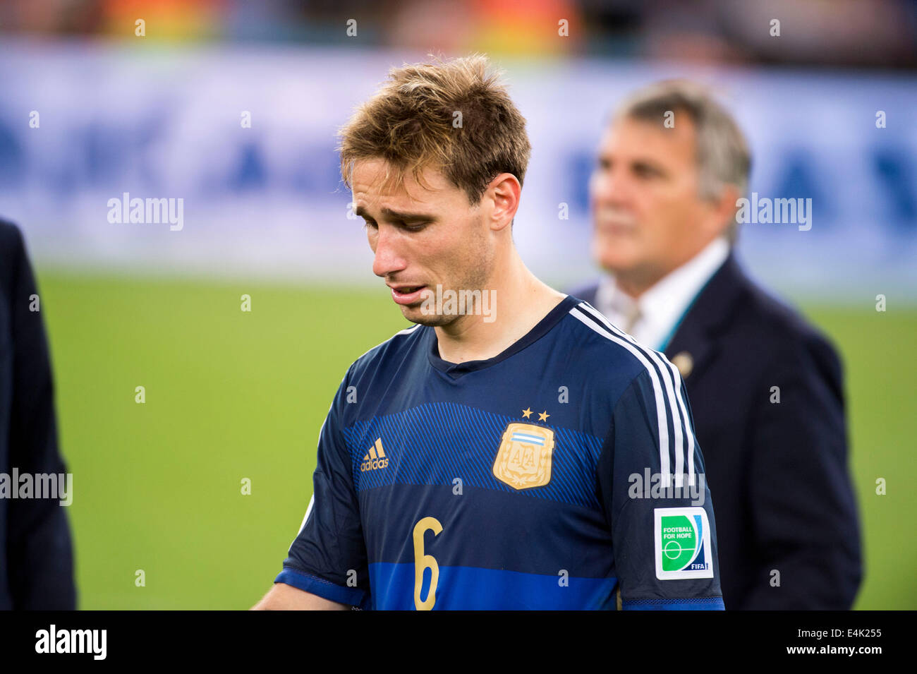 Rio de Janeiro, Brazil. 13th July, 2014. Lucas Biglia (ARG) Football/Soccer : Lucas Biglia of Argentina looks dejected after the FIFA World Cup Brazil 2014 Final match between Germany 1-0 Argentina at the Maracana stadium in Rio de Janeiro, Brazil . Credit:  Maurizio Borsari/AFLO/Alamy Live News Stock Photo