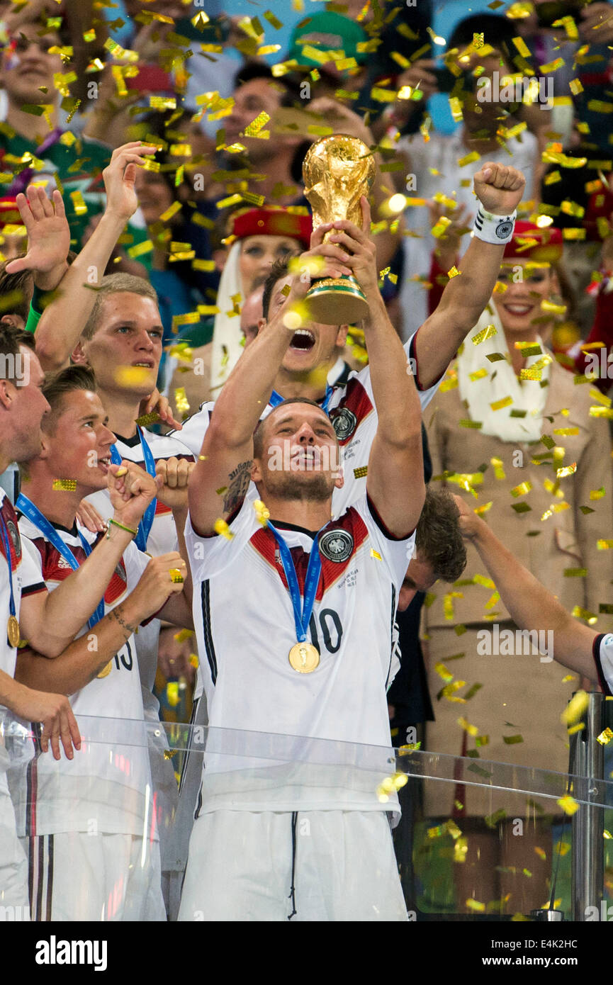 Rio de Janeiro, Brazil. 13th July, 2014. Lukas Podolski (GER) Football/Soccer : Germany players celebrate after winning the FIFA World Cup Brazil 2014 Final match between Germany 1-0 Argentina at the Maracana stadium in Rio de Janeiro, Brazil . Credit:  Maurizio Borsari/AFLO/Alamy Live News Stock Photo
