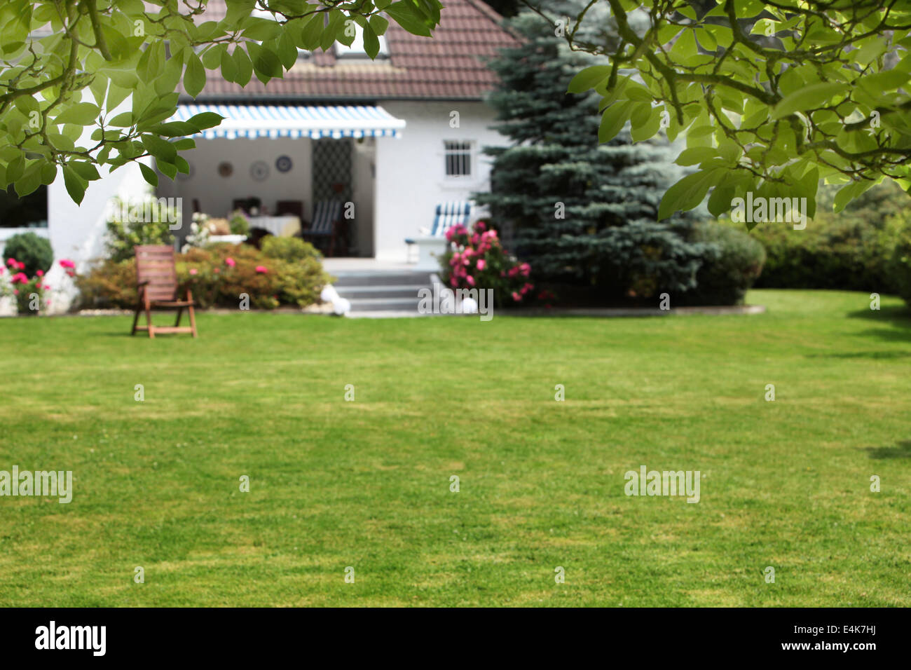 Small house with beautiful garden Stock Photo - Alamy