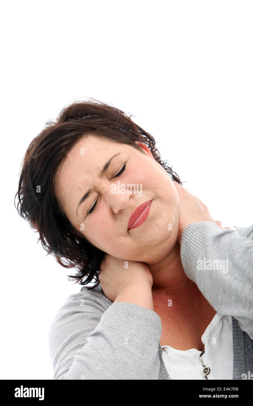 Woman stretching her stiff neck Stock Photo