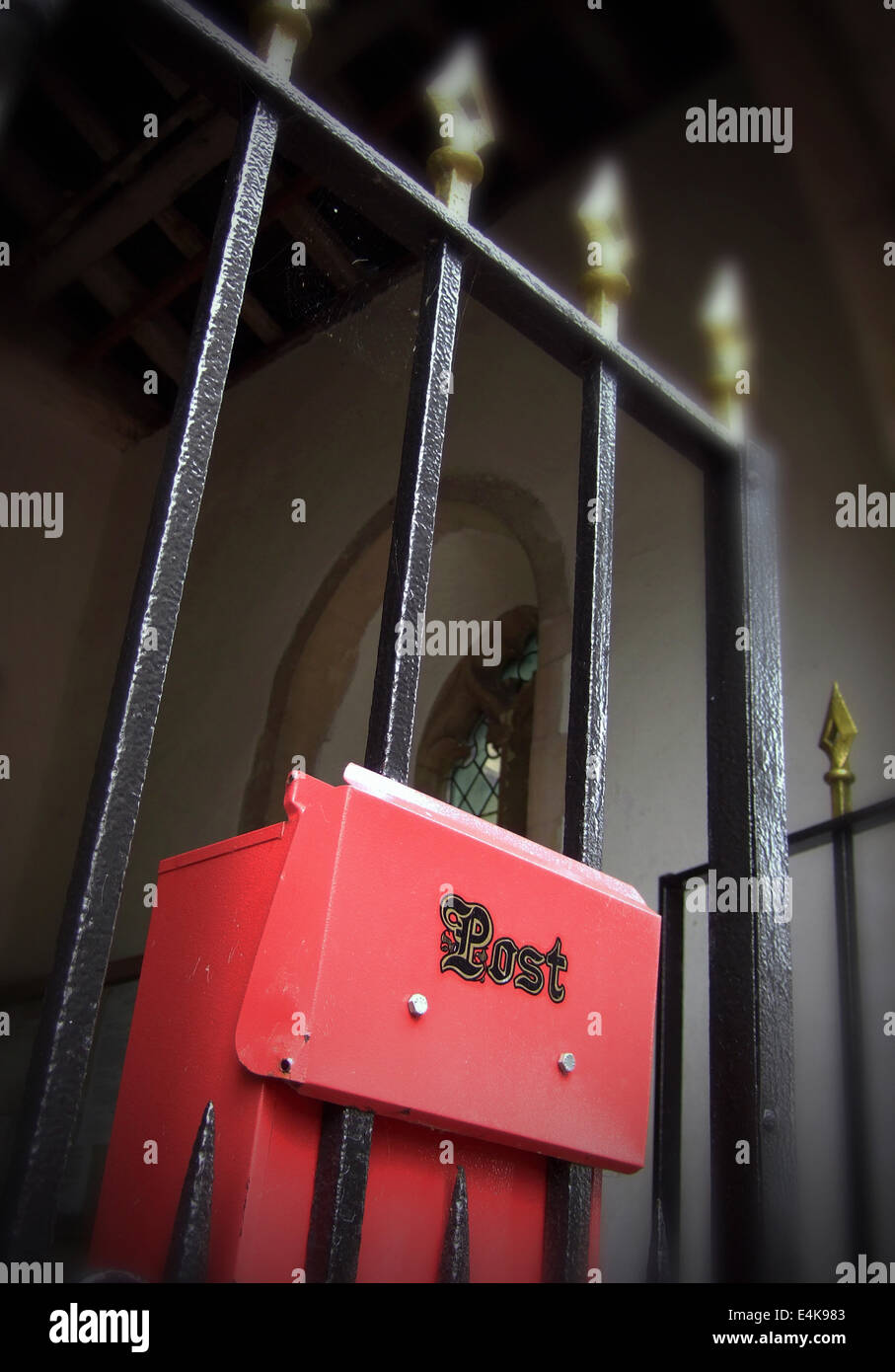 post box on iron gate Stock Photo Alamy