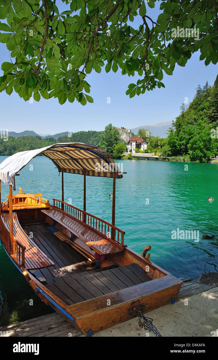 wooden boat called pletna,lake bled,slovenia stock photo