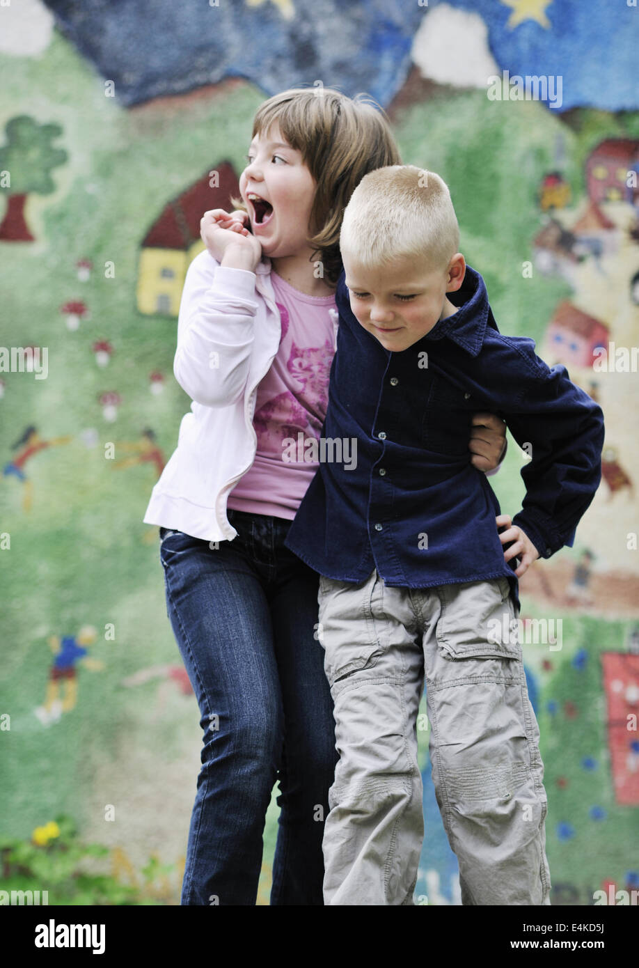 happy brother and sister outdoor in park Stock Photo - Alamy