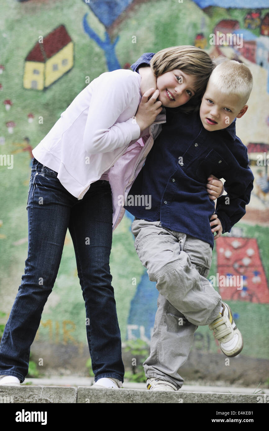 happy brother and sister outdoor in park Stock Photo - Alamy